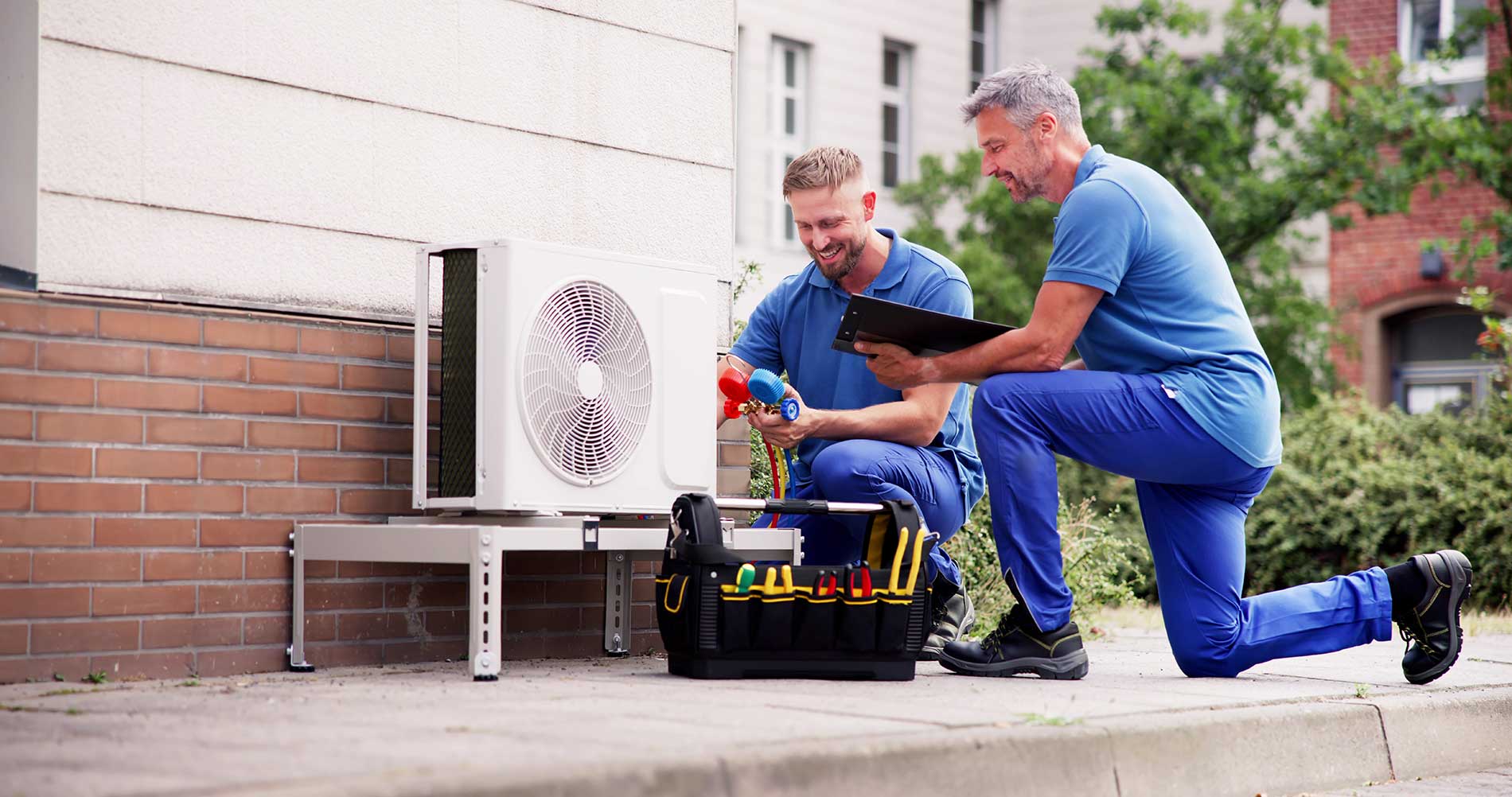 Industrial-Air-Conditioning-Technician-working-on-a-unit
